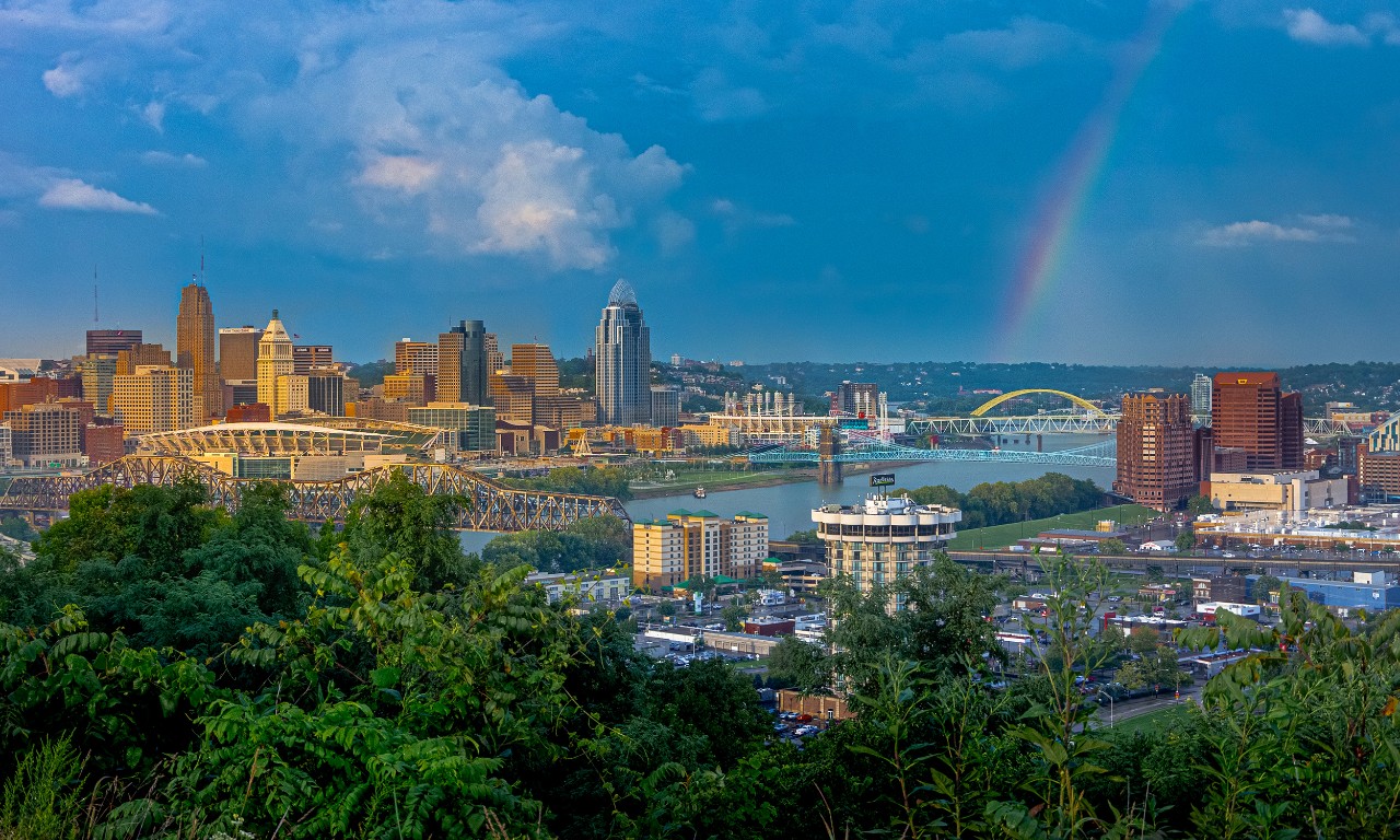view of Cincinnati skyline with a rainbow