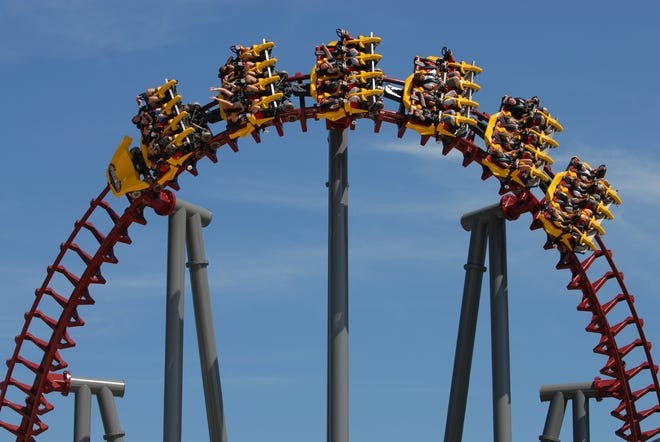 people riding a rollercoaster