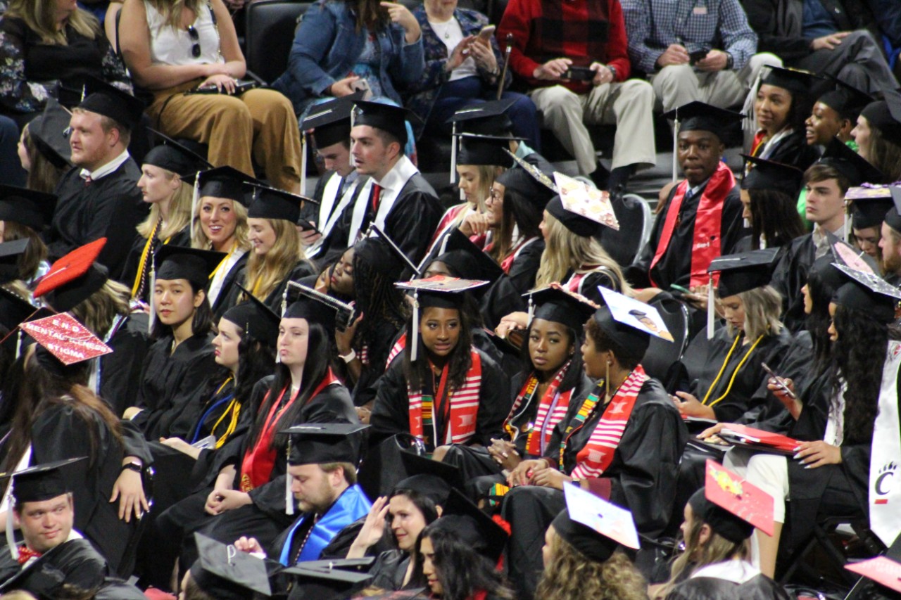 UC students at a commencement ceremony.