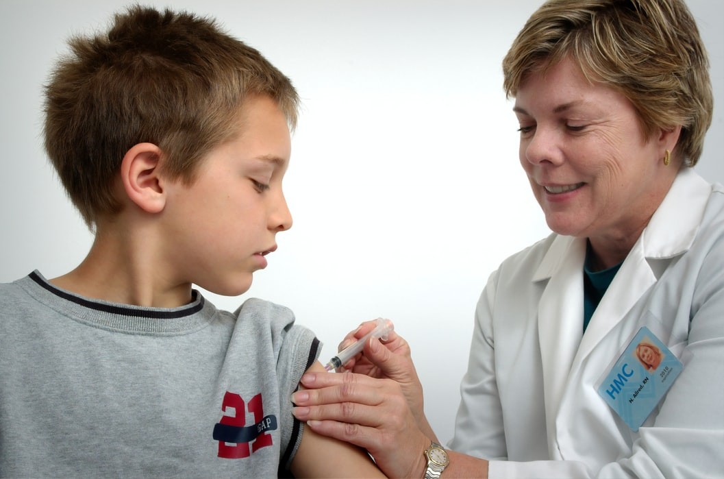 child being vaccinated