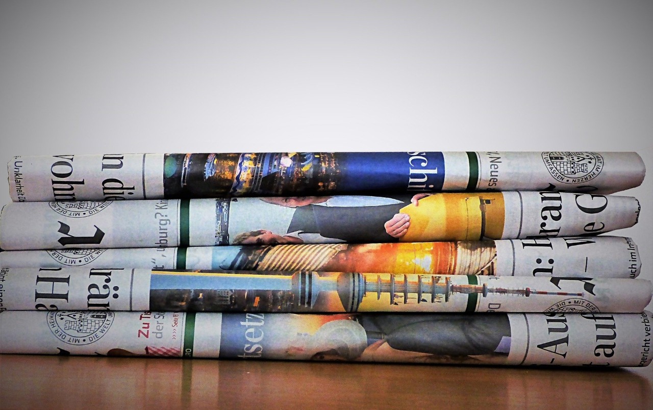 Stack of newspapers.