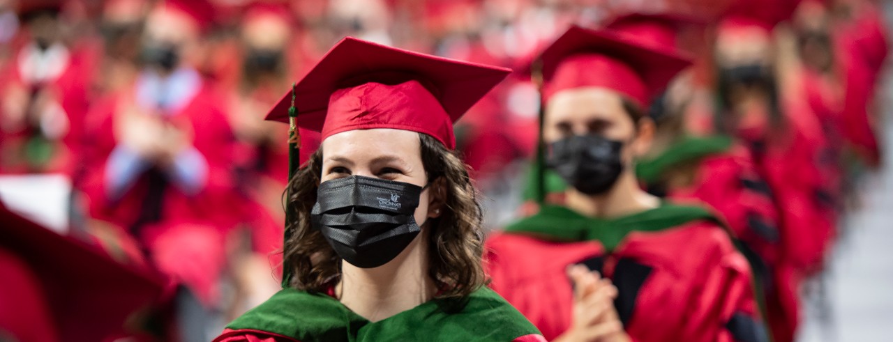 image of masked graduates