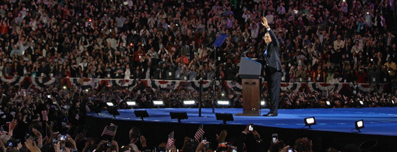 A photograph featuring Kevin Lawson's work on Barack Obama's 2012 election night rally.