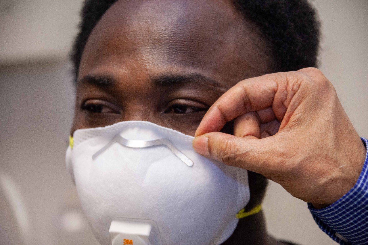 UC College of Engineering and Applied Science grad student Israel Ajiboye wears an N95 face mask.