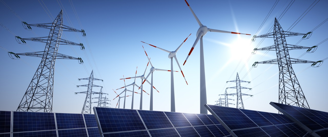 Windmills, power lines, and solar panels.