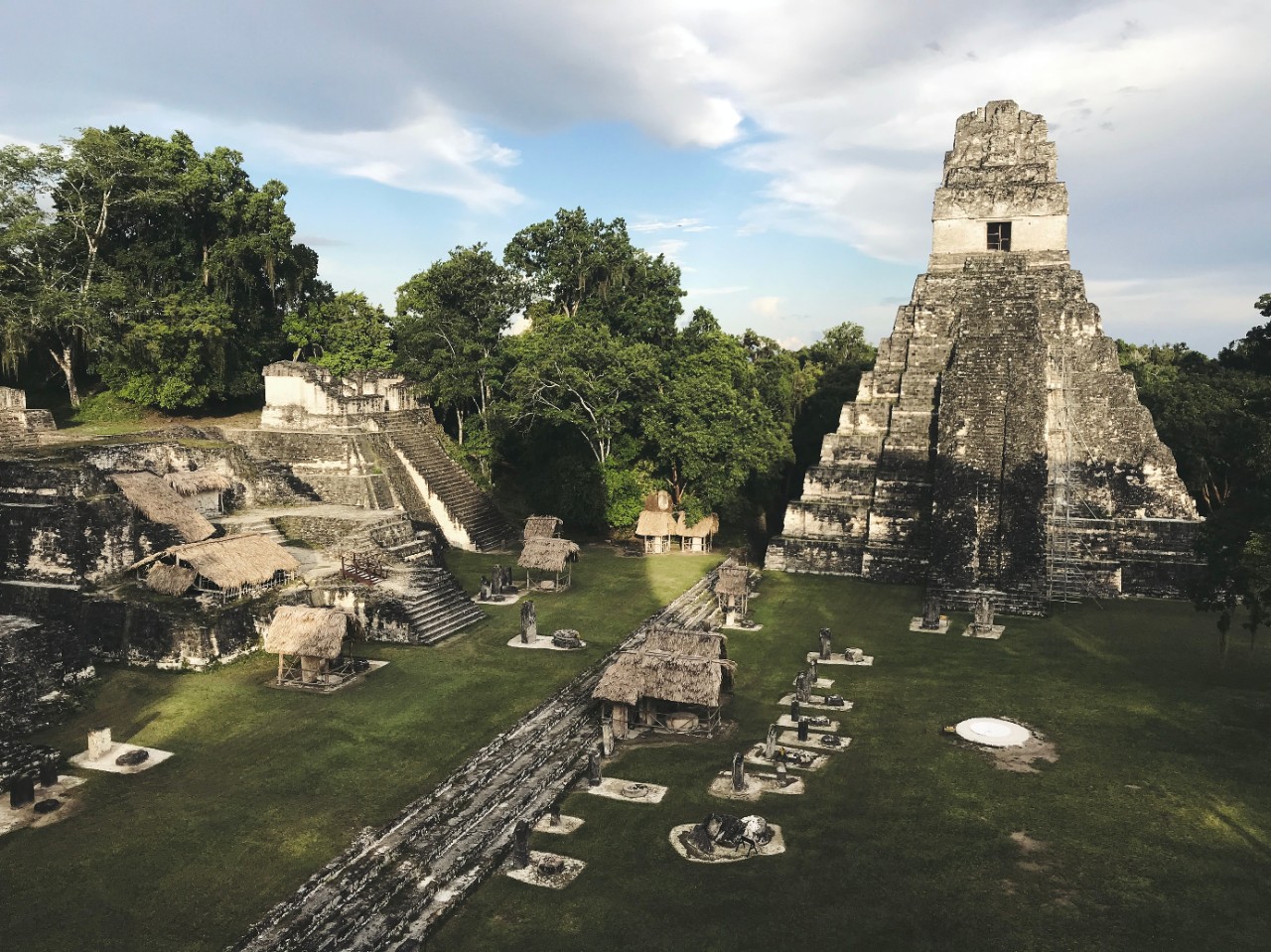 A temple at Tikal rises above the rainforest.