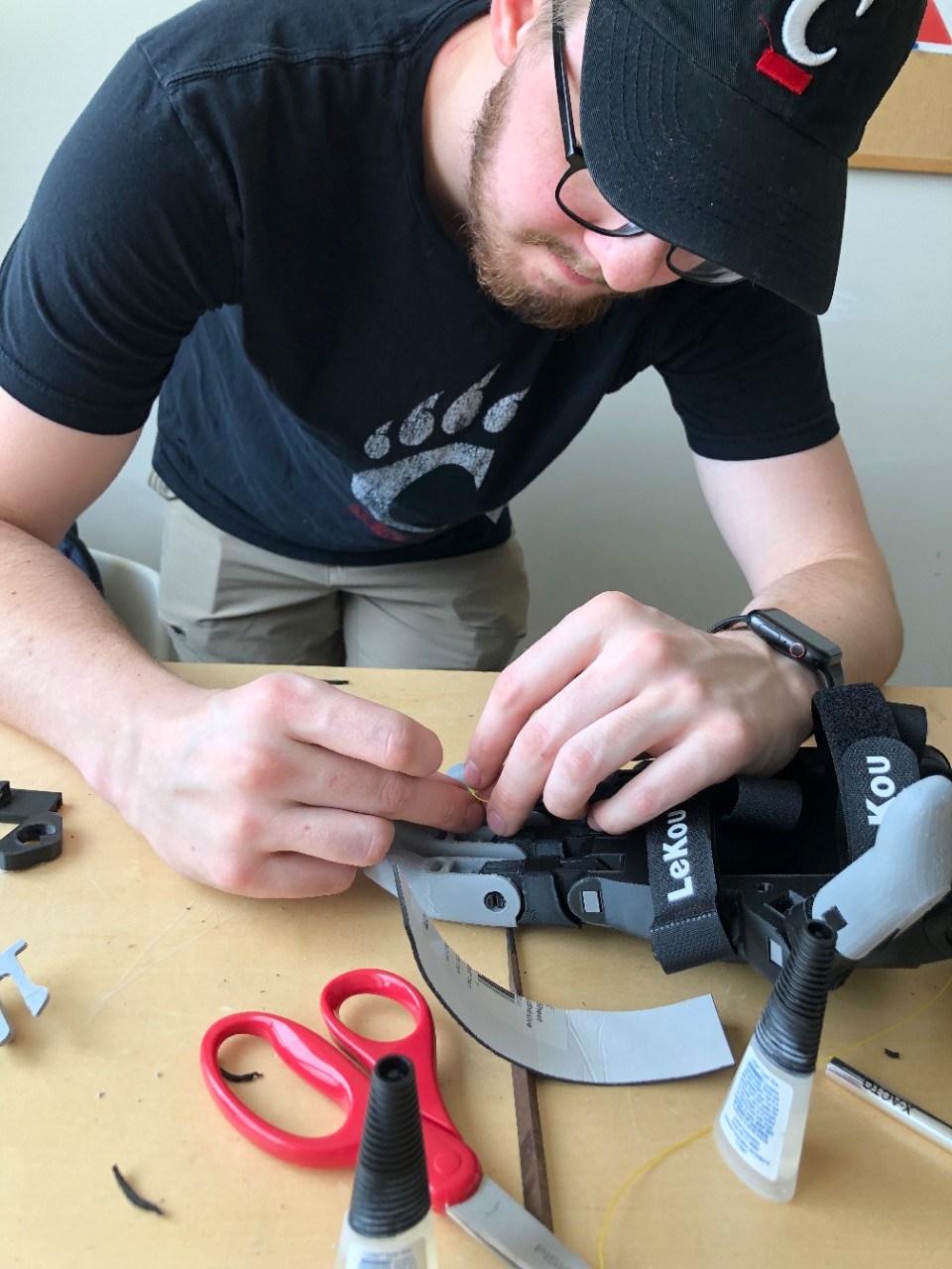 Andrew working on a mechanism