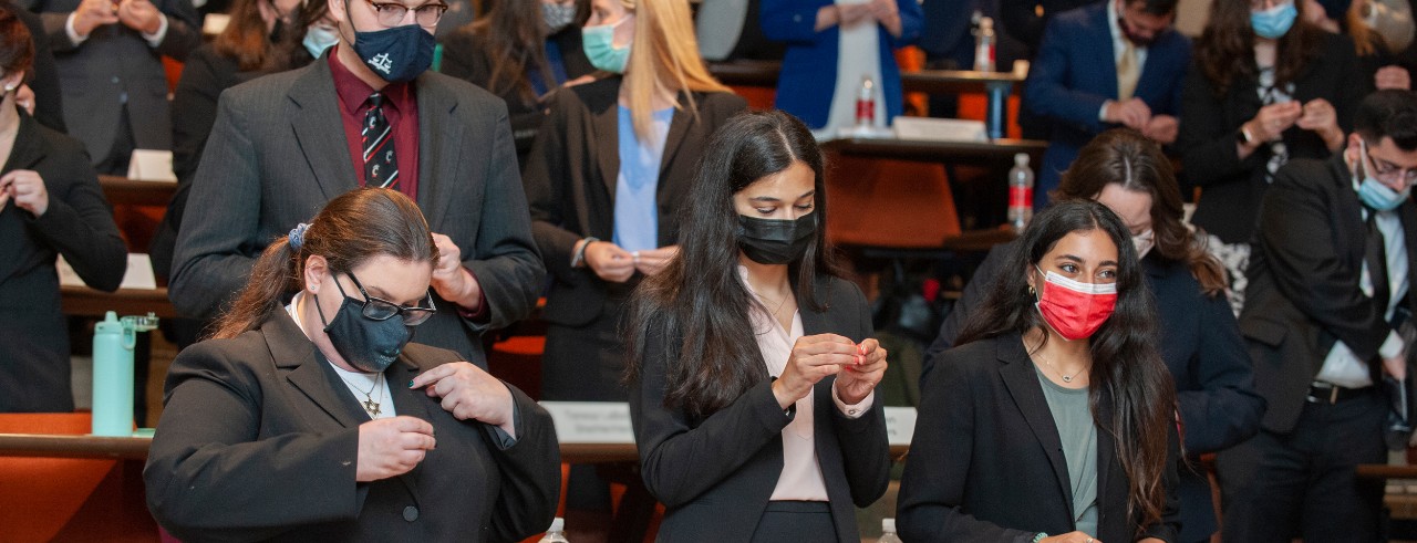 Incoming first-year students act pledge and pinning ceremony