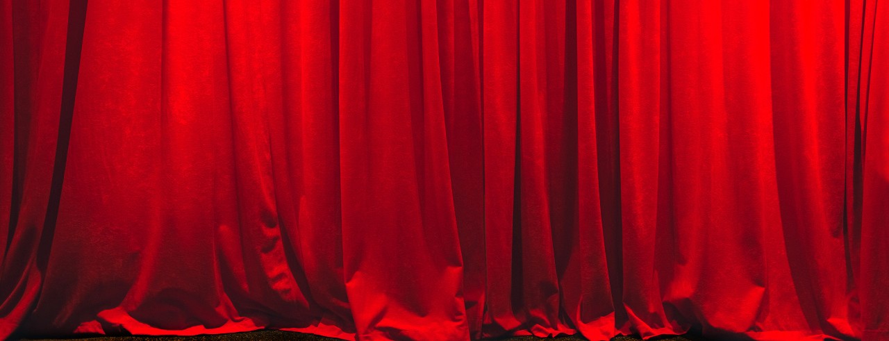 A red curtain on stage