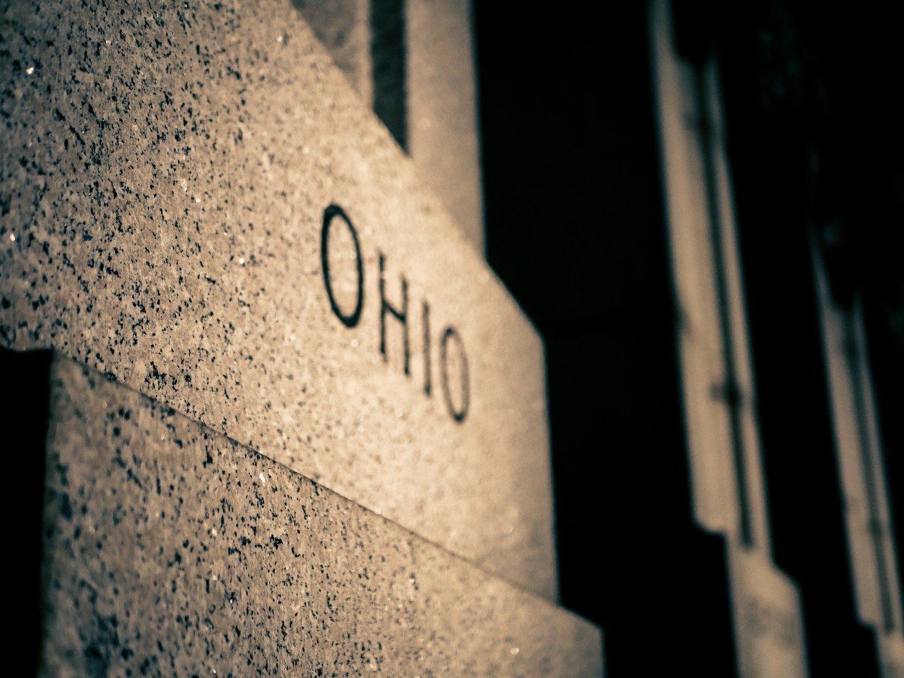 Photo of the word Ohio engraved into stone wall