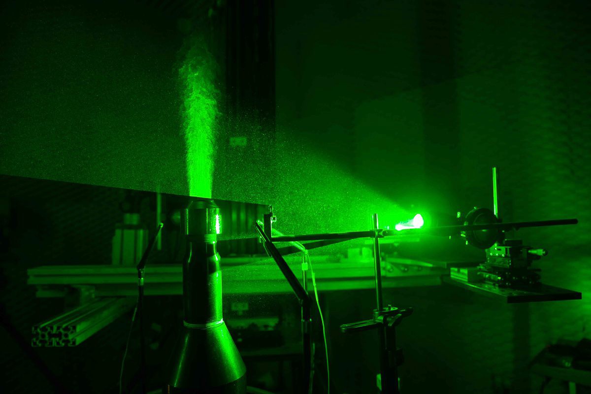 Laser light illuminates a jet engine in UC's aeroacoustics lab.