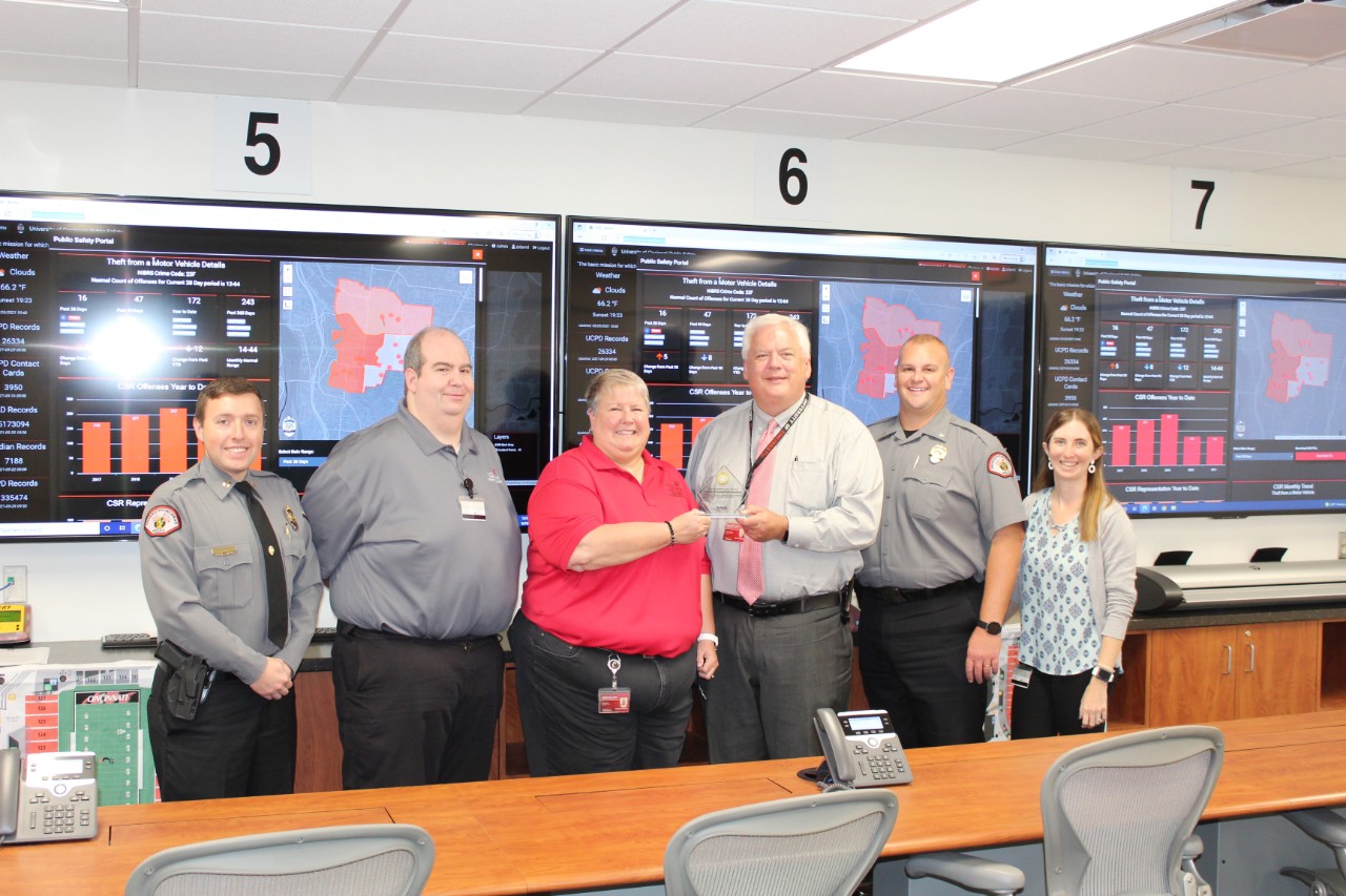 Members of UC Public Safety pose with the SmartSave Award.