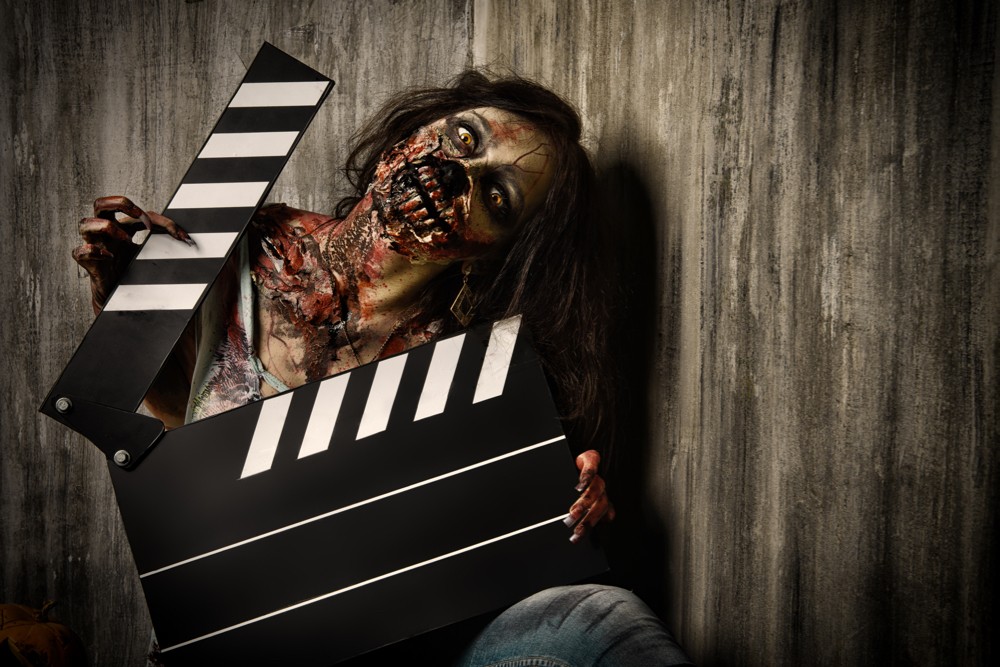 zombie with a movie "action" card