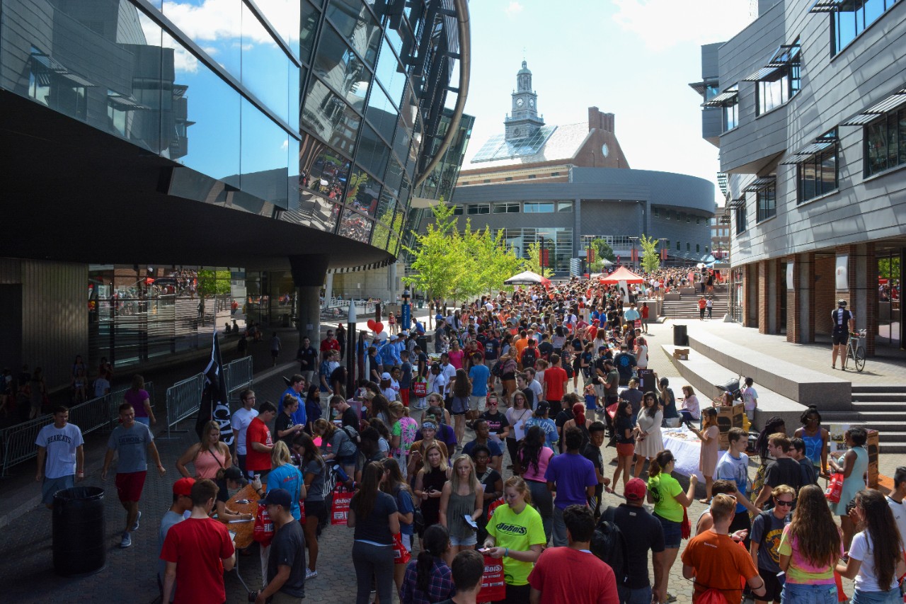 Image of thousands of UC students attending student fair organization day along Main Street on campus