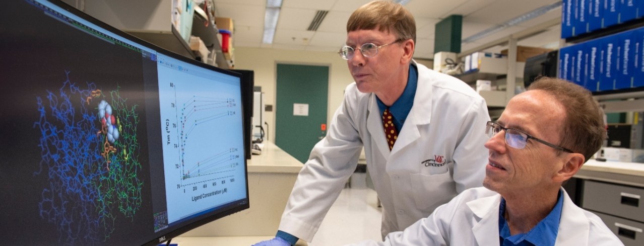 University of Cincinnati professor Andrew Norman works in his lab.