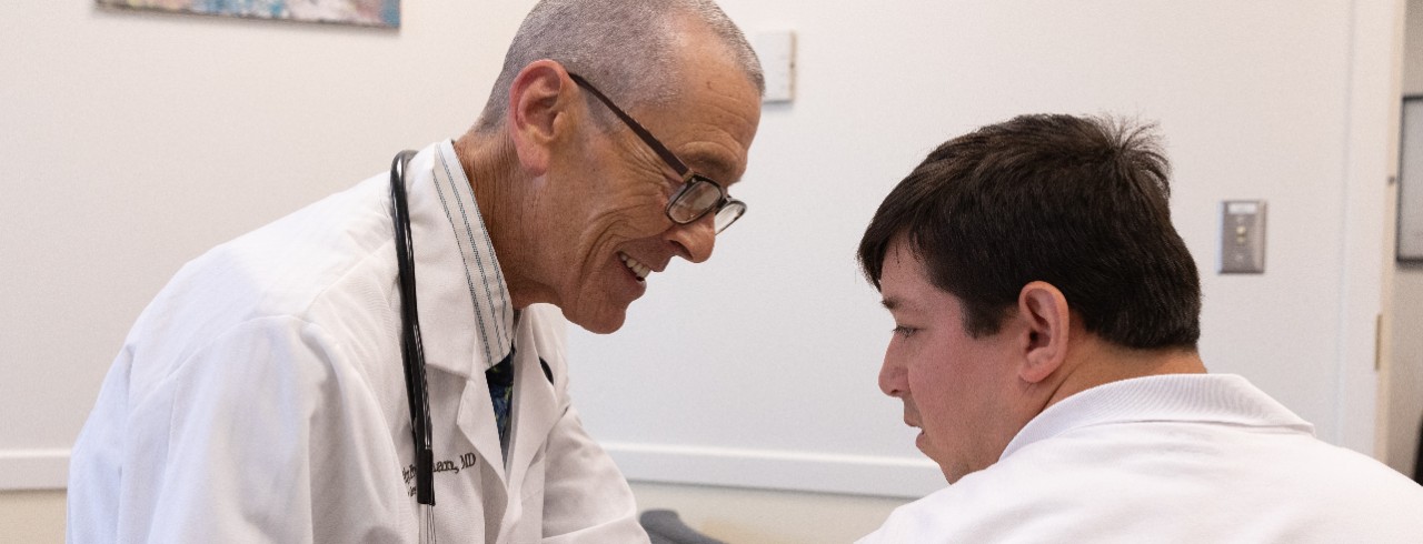 Dr. Timothy Freeman with a patient