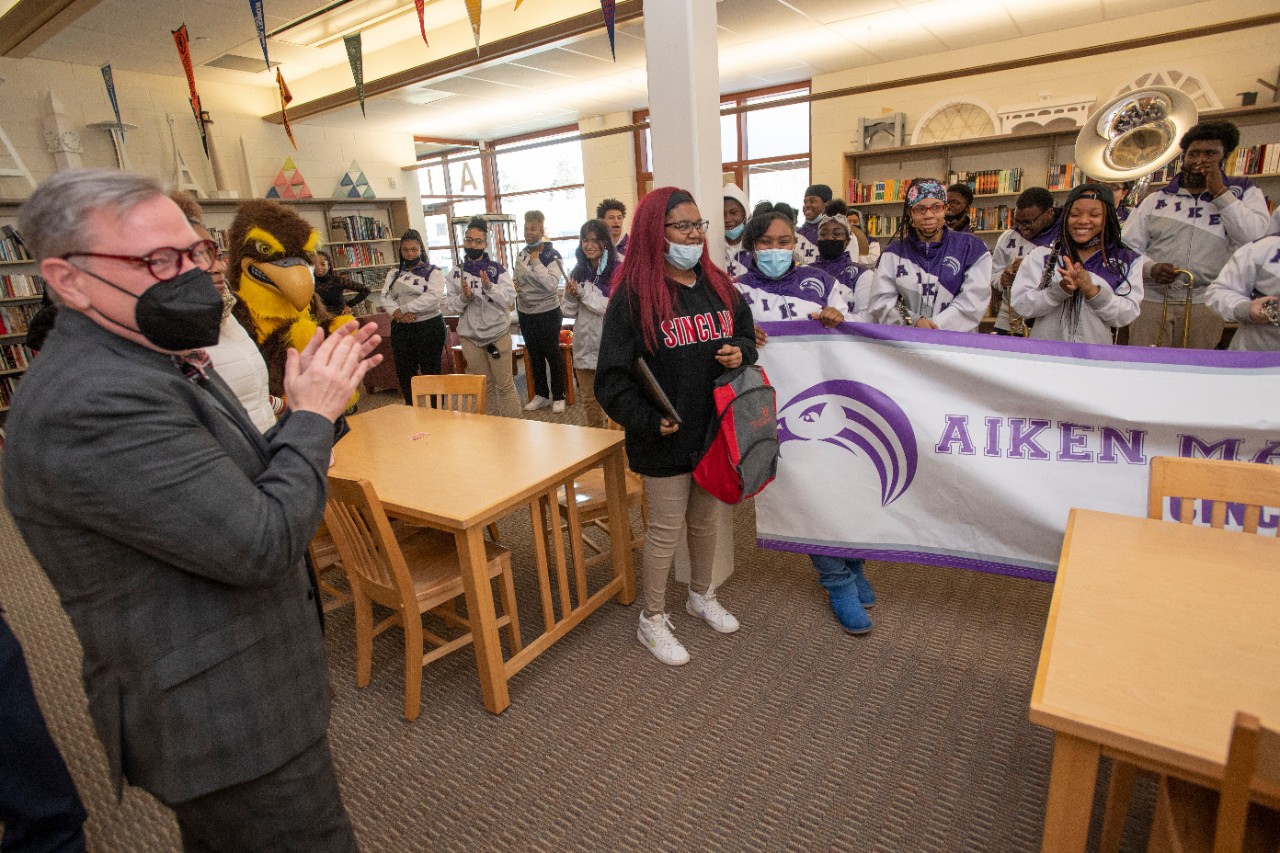 Students and marching band