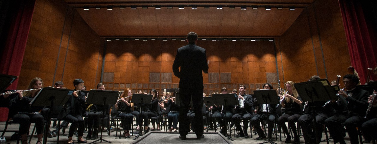CCM Wind Symphony performs on stage