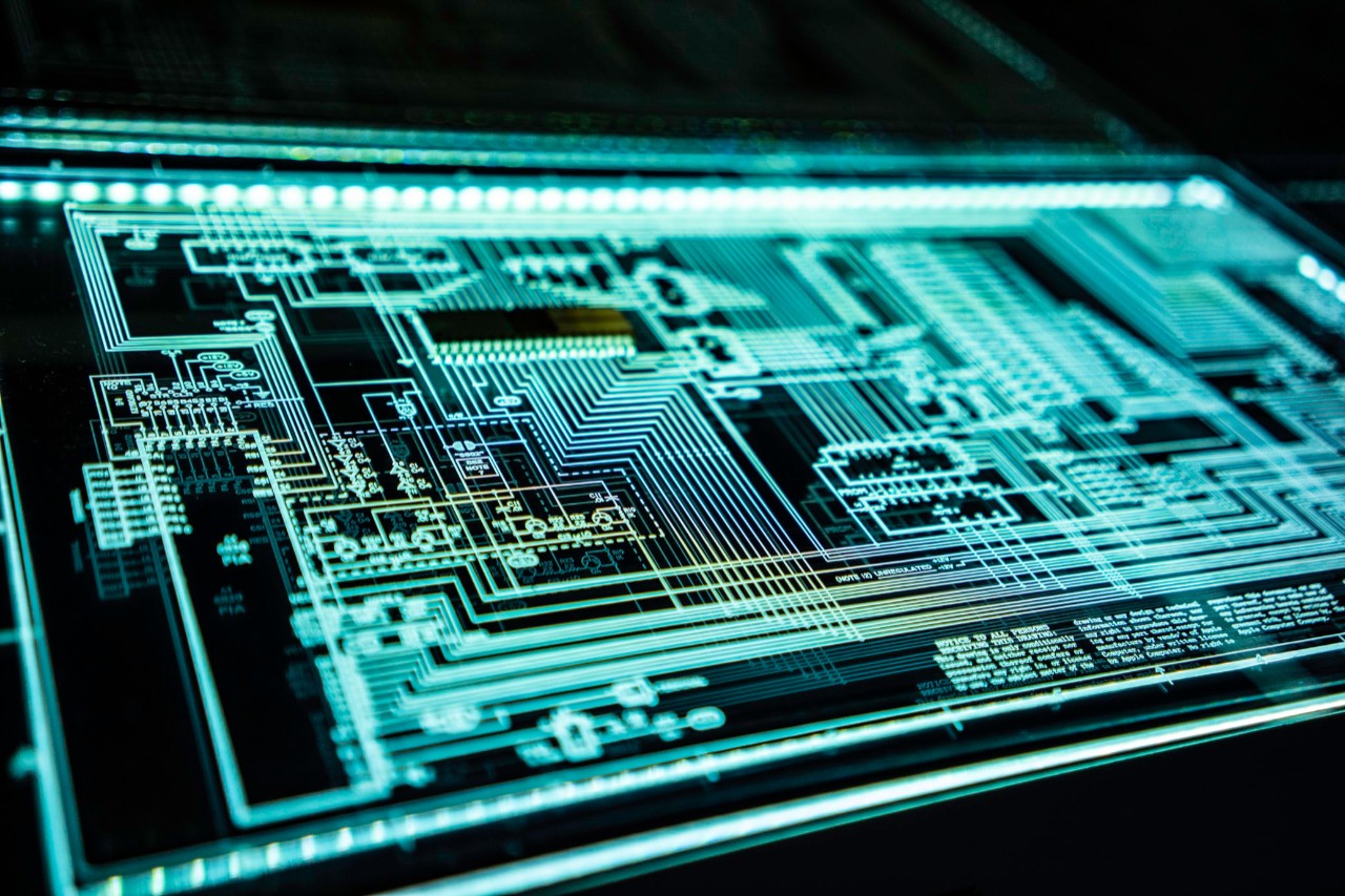 An illuminated schematic of a computer chip.