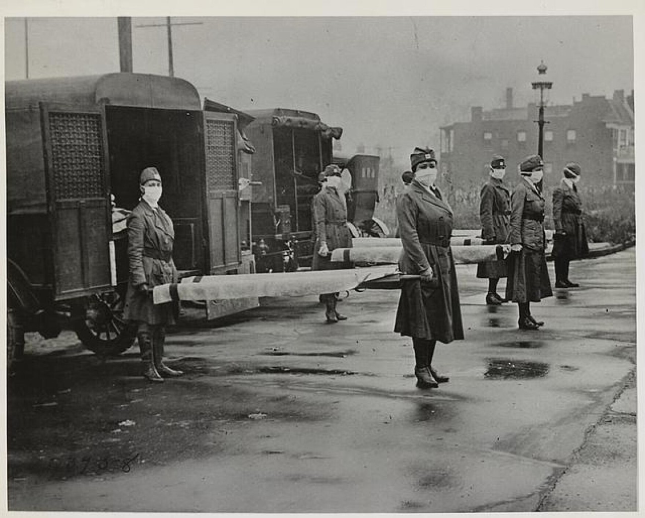 a photo of the St. Louis Red Cross Motor Corps on duty in Oct. 1918 during the influenza epidemic.