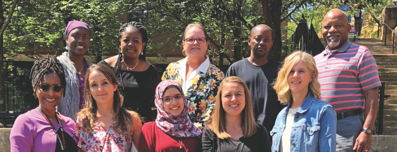 Group photo of PhD cohort that includes Louis Gamba Ti Banguima (back row, fourth from left)