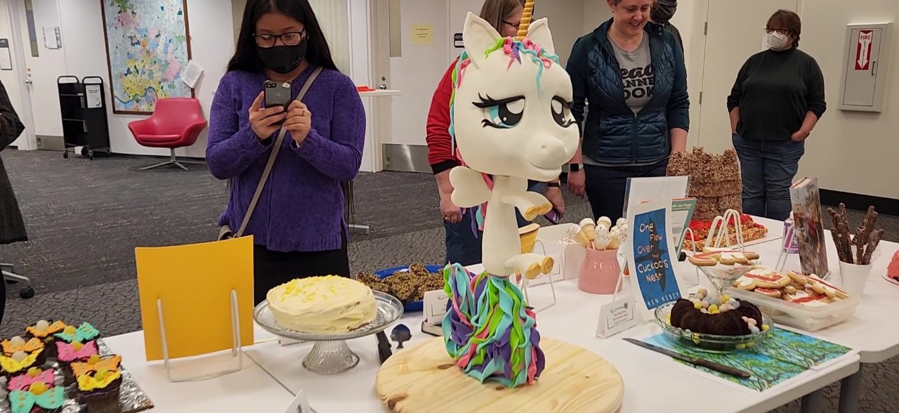 Edible books entries 2022. Table with unicorn cake.