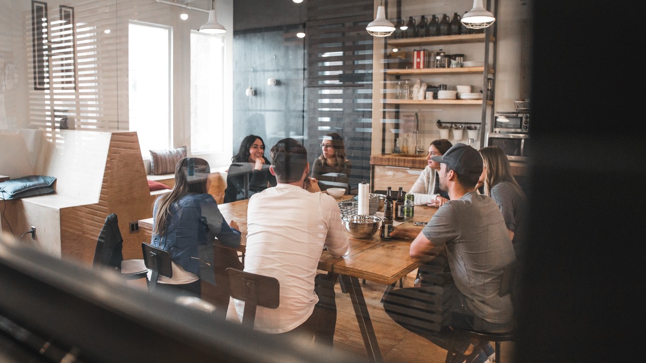 Workers in a collaborative meeting.