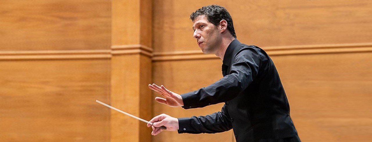 A photo of CCM alum Avishay Shalom conducting during the 2022 edition of the Arthur Nikisch International Conducting Competition. Photo/Vasilka Balevska