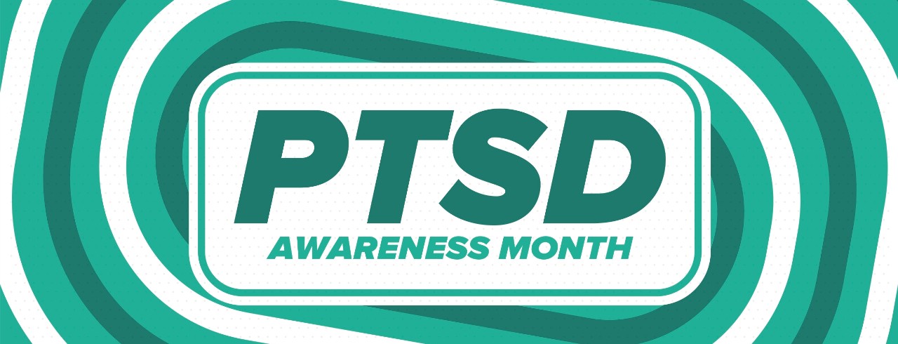 A graphic on a green and white background that says PTSD Awareness Month