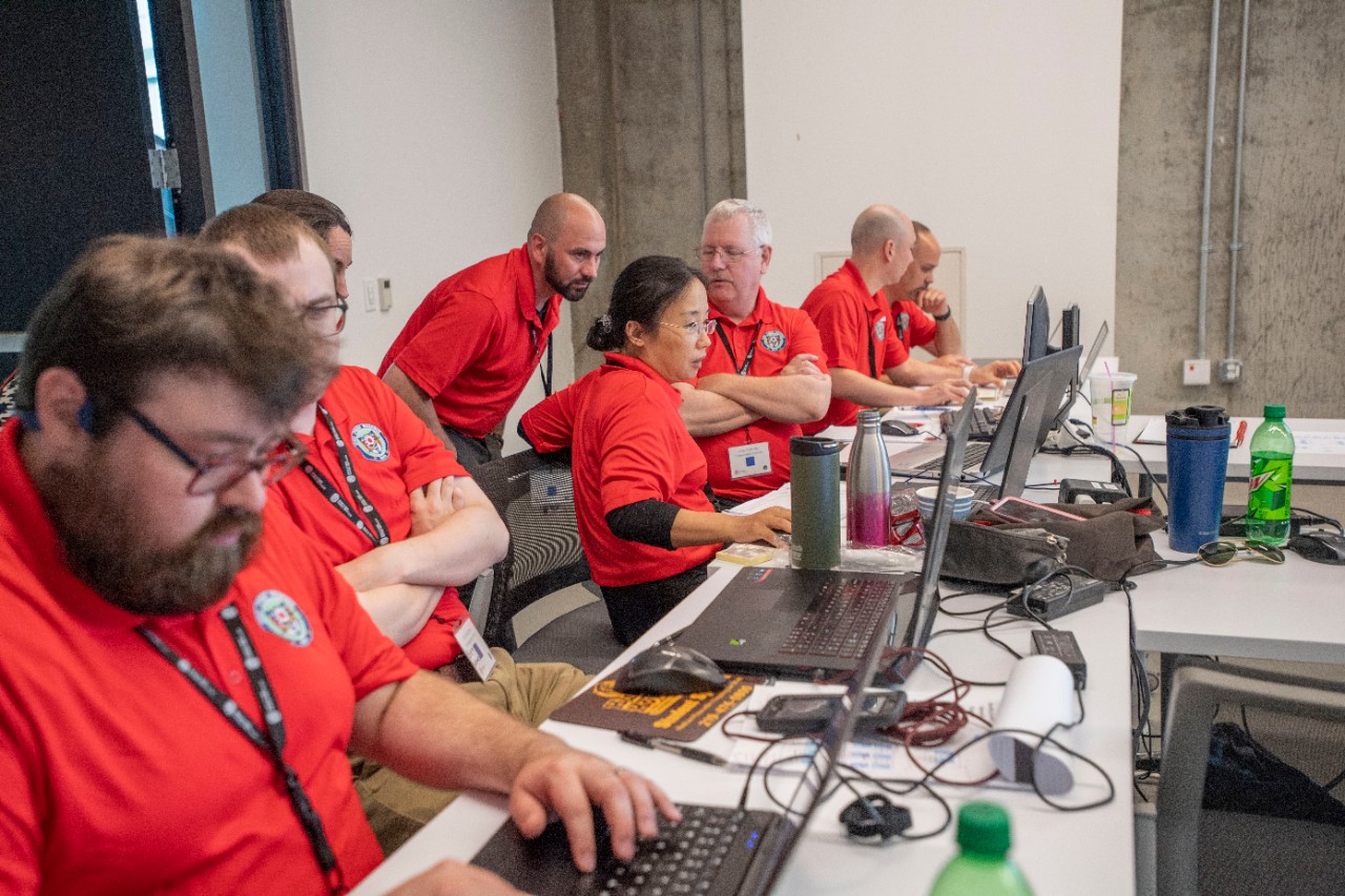 Members of the Ohio Cyber Reserve take part in a training exercise at the University of Cincinnati's 1819 Innovation Hub.