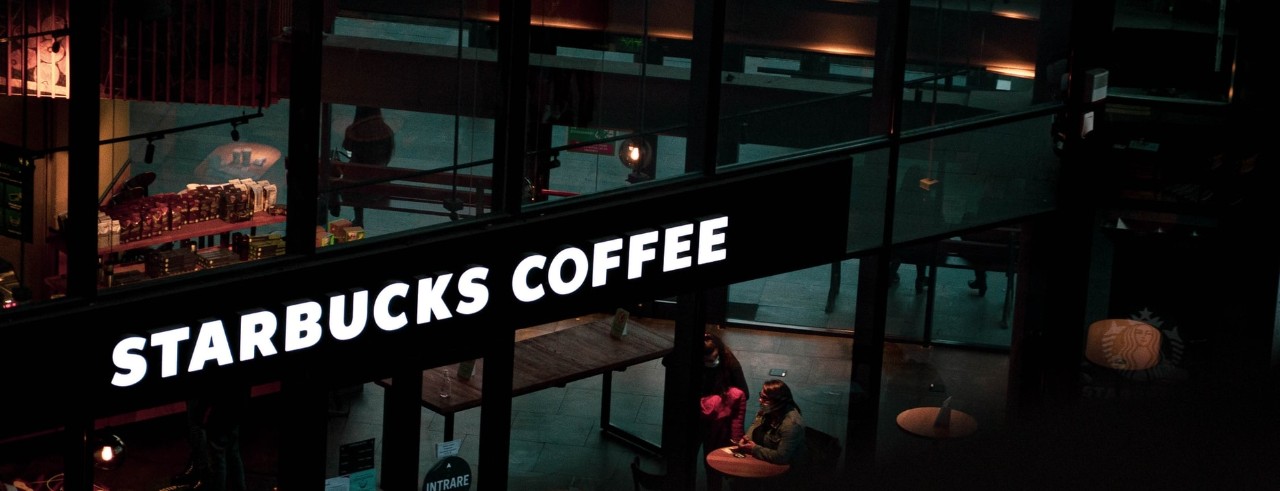 Starbucks Coffee signage at night