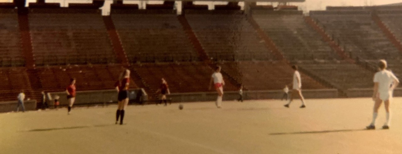 1981 omen's soccer team practicing in Nippert Stadium