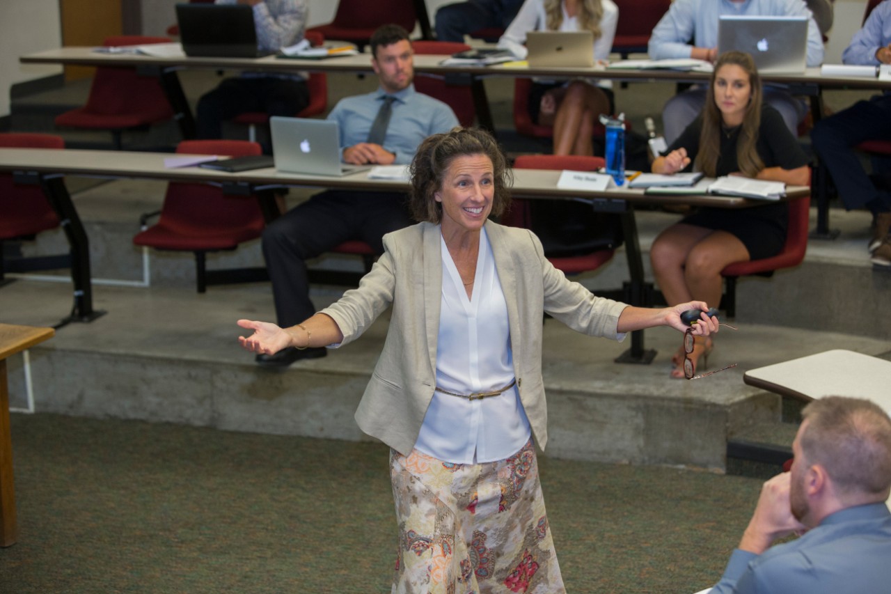 Professor Janet Moore engages with students. 