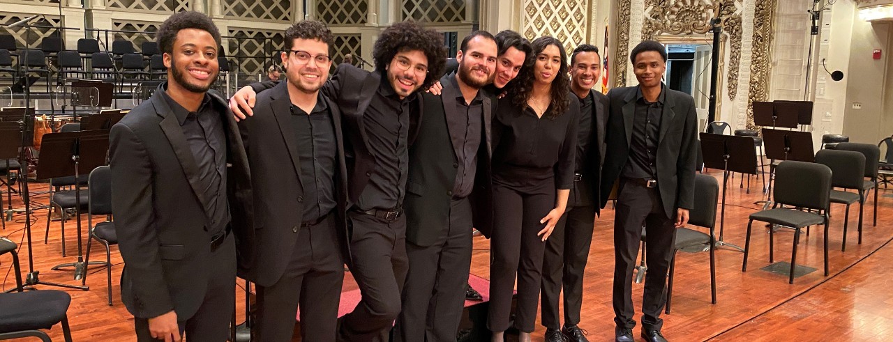 Members of the 2021-22 CSO/CCM Diversity Fellowship cohort on the stage of Springer Auditorium at Cincinnati Music Hall. Photo/Provided by the CSO.