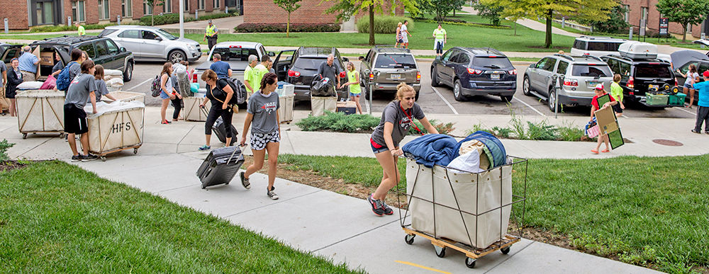 Students move their belongings into residence halls