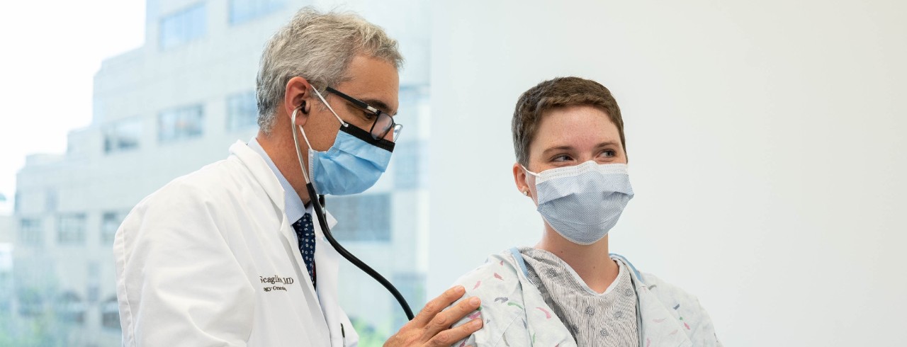 Dr. Scaglioni examines a patient