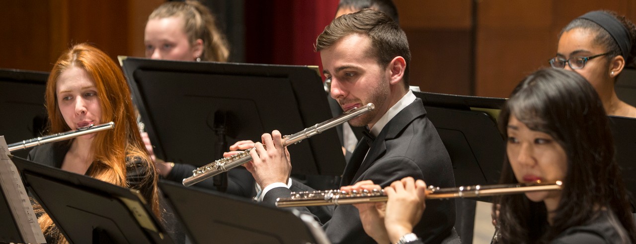 CCM Wind Symphony performs on stage