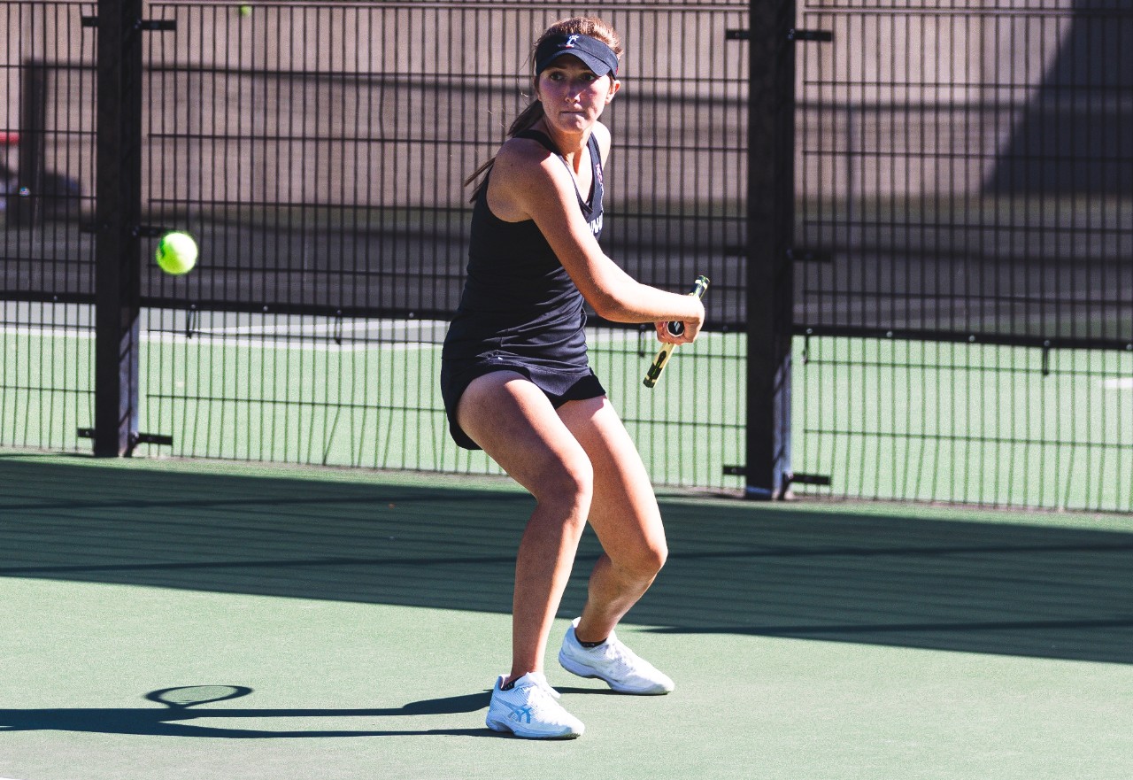 Maria Santilli prepares to hit a backhand.