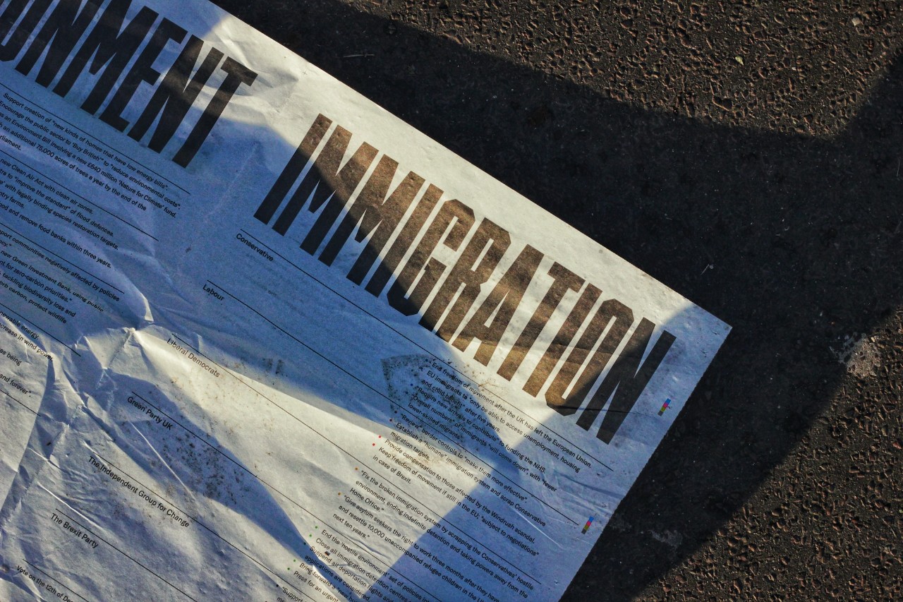 photo of an immigration form on the ground