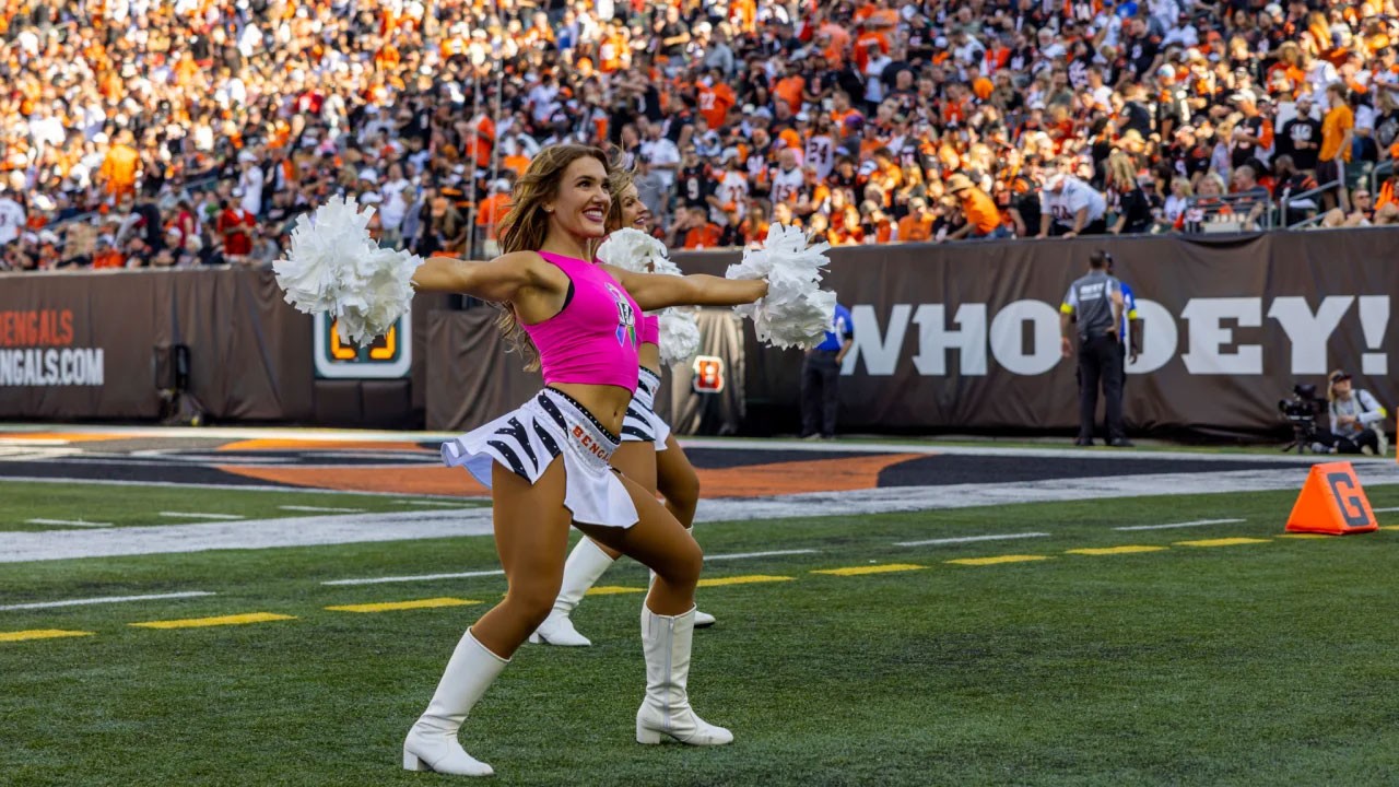 Emily Berning on the Cincinnati Bengals football field as a Ben-Gals cheerleader
