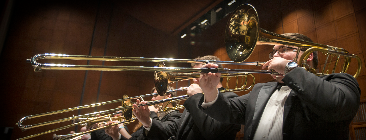 Trombonist performing on stage