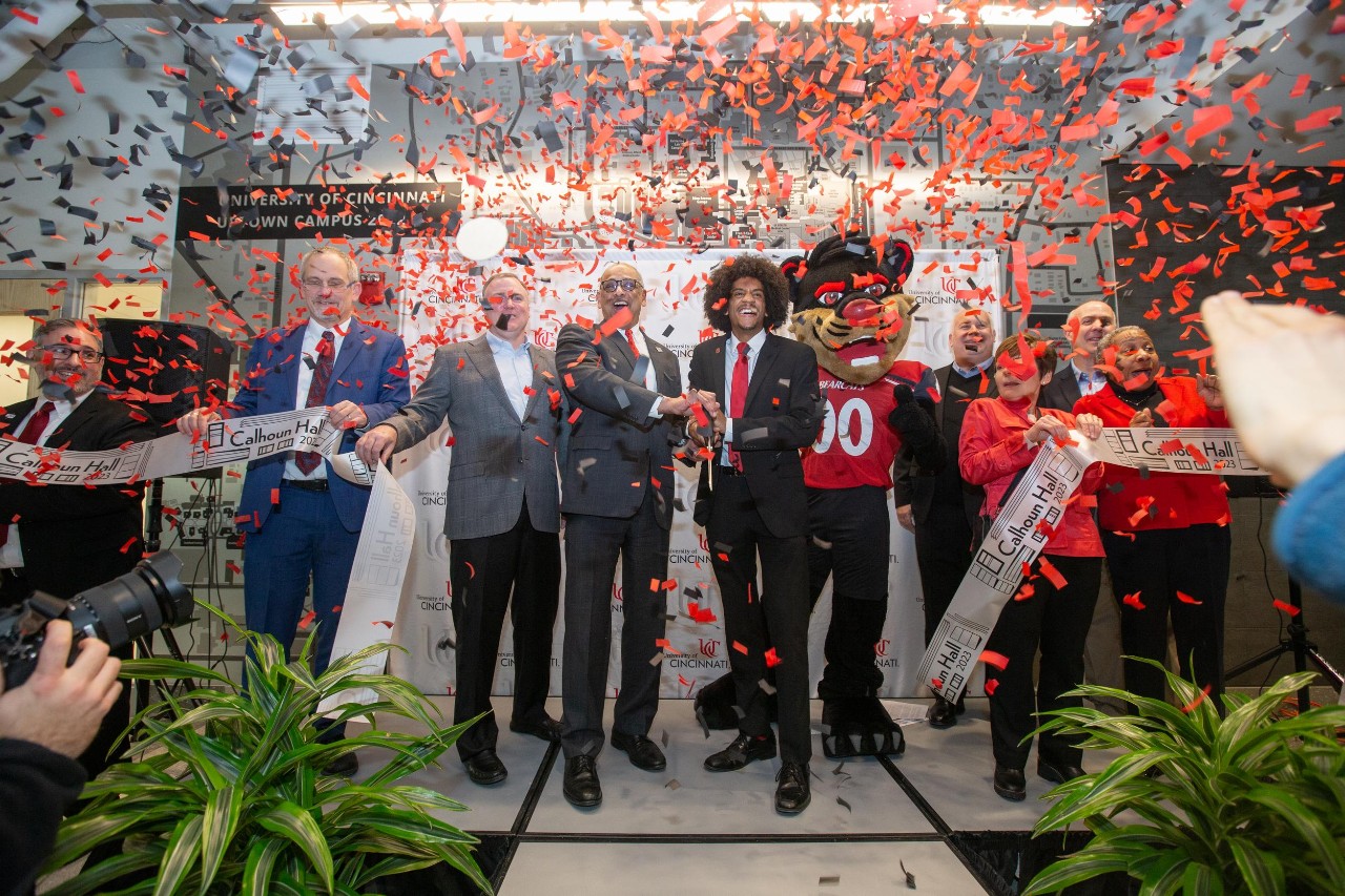 UC President Neville Pinto and UC student body president Isaac Smitherman joined by staff and administrators for ribbon cutting ceremony at Calhoun Hall.