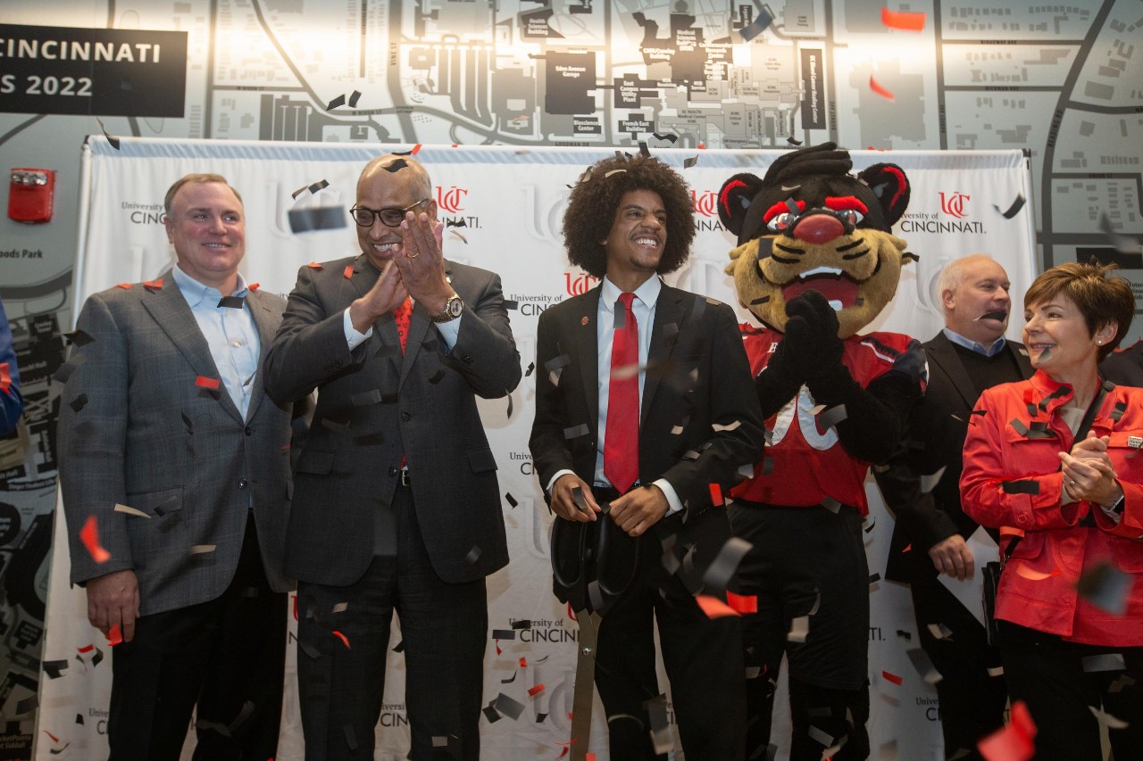Image of UC President Neville Pinto and UC Student Body President Isaac Smitherman with others at the ribbon cutting for Calhoun Hall