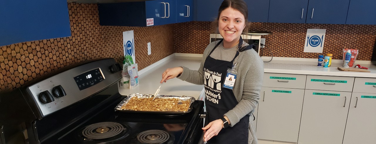 Emily Wieczorkowski cooks in a teaching kitchen