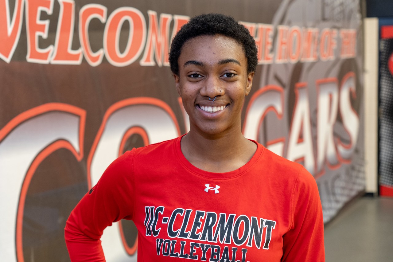 Kayla Williams smiles in a UC Clermont volleyball shirt
