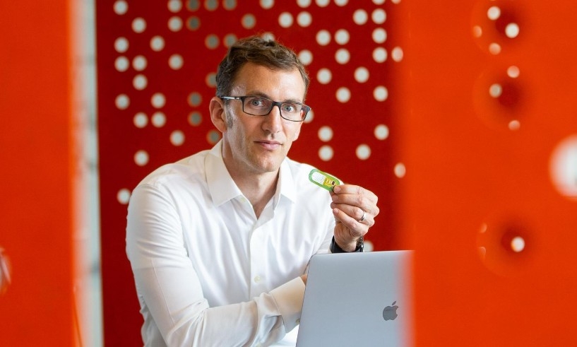 Jason Heikenfeld with his sweat sensor technology at the 1819 Innovation Hub.