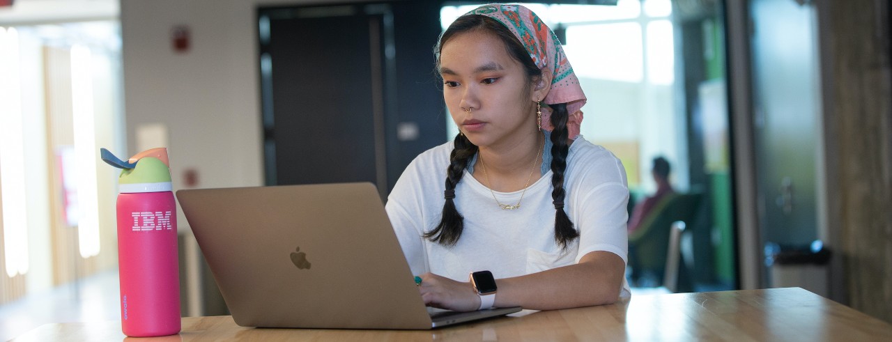 University of Cincinnati student Liz Tremblay works on a laptop