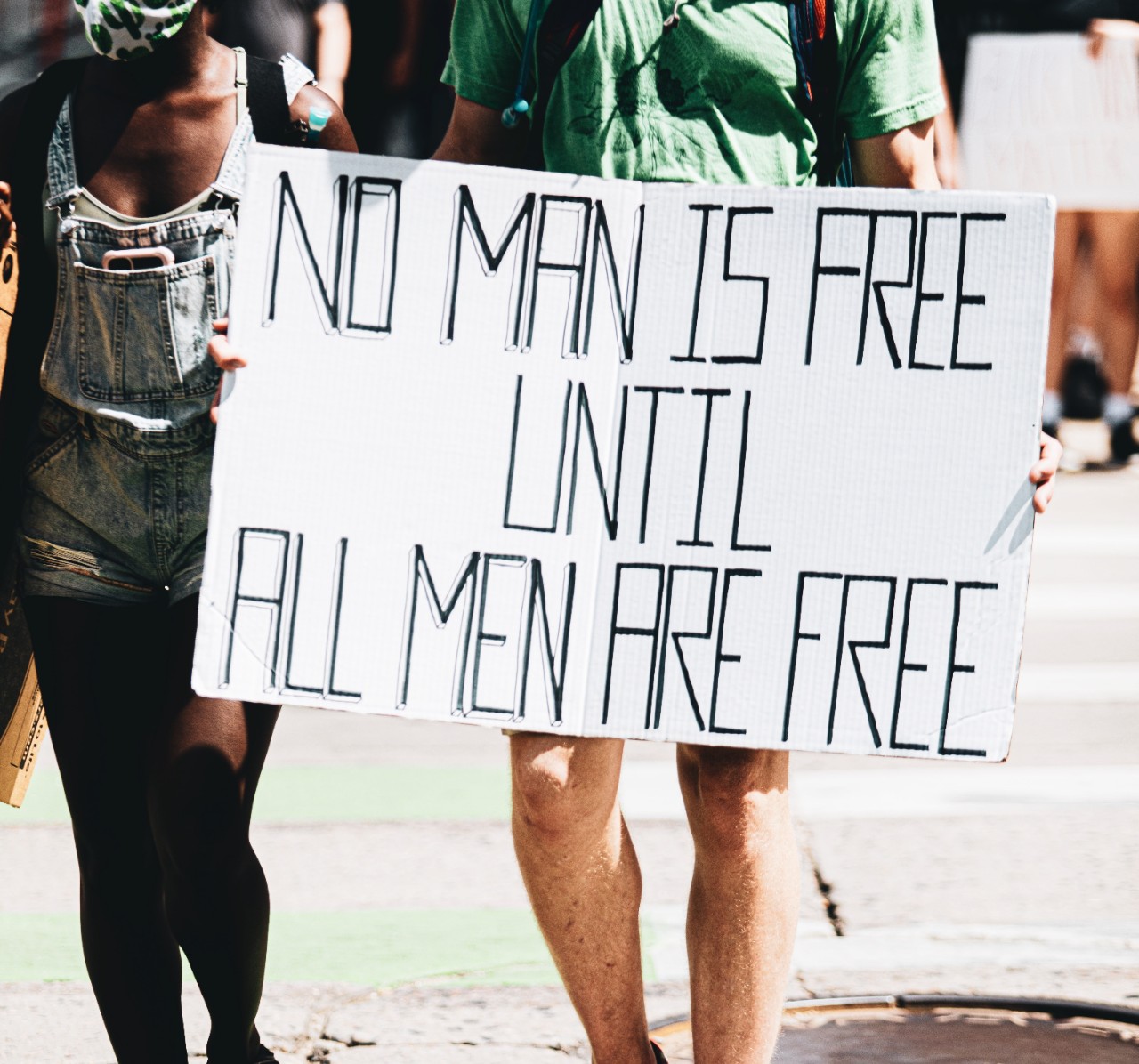 Image of sign at a civil rights protest.