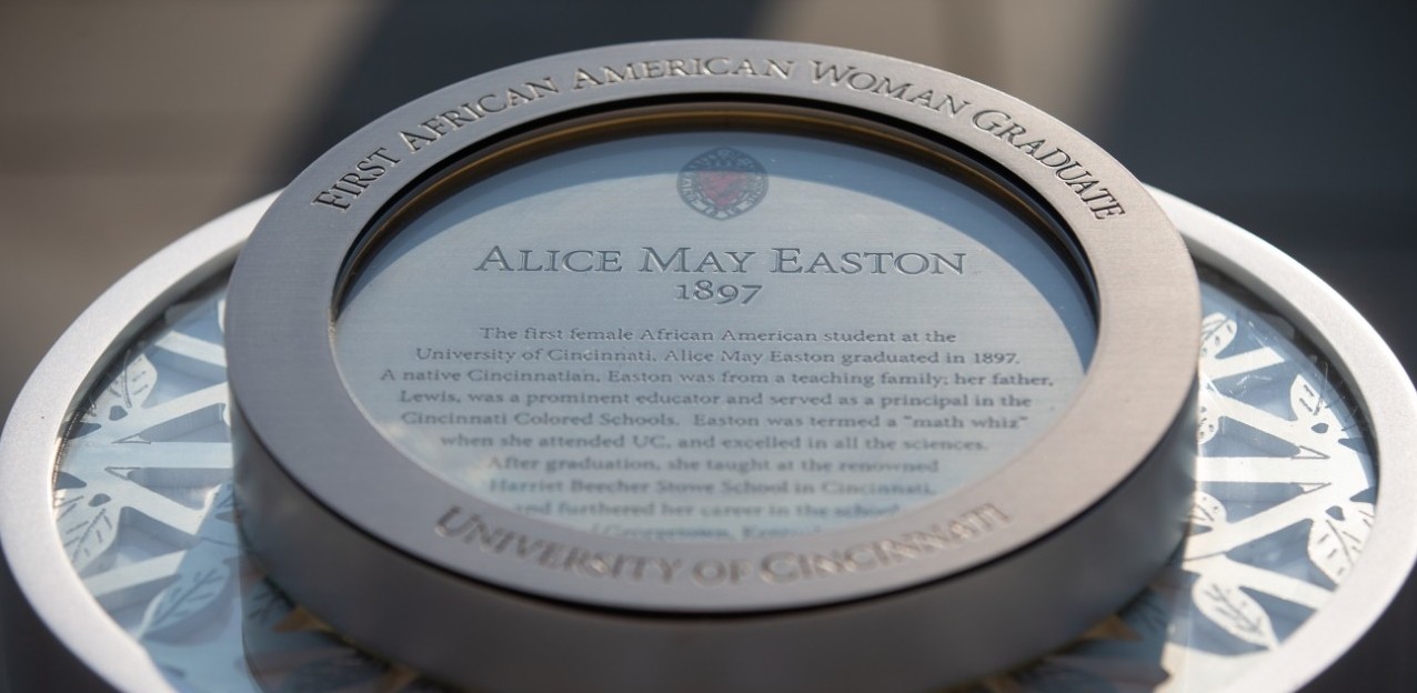 First black UC graduate Alice May Easton memorial is a pedestal with a circle on top, with text that tells the Easton story 