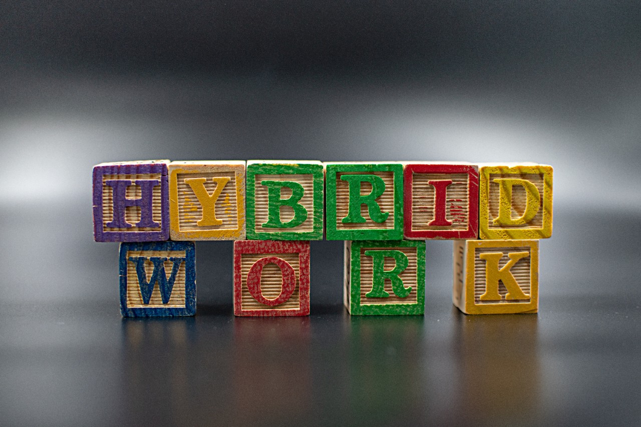 Blocks spelling out "hybrid work"